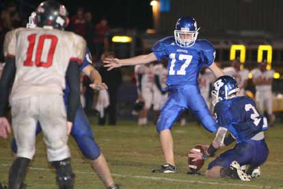 Sophomore Jace Denker (17) provides Bryant's only points out of a hold by Brandon Parish (2). (Photo by Rick Nation)