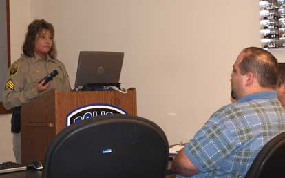 Det. Sgt. Alison Hoskins of the Saline County Sheriff’s Department speaks to the Citizen's Police Academy class. (Photo by Lana Clifton)