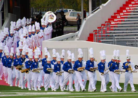 The Legacy of Bryant makes its entrance into War Memorial Stadium in Little Rock.