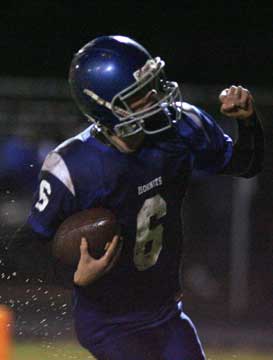 Austin Powell pumps his first after scooping and scoring for the Hornets. (Photo by Rick Nation)