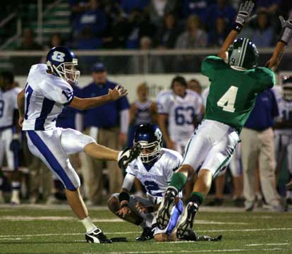 Jace Denker booted a 42-yard field goal against Van Buren and all seven extra points. Brandon Parish is the holder with Van Buren's Joseph Snapp (4) trying to block the kick. (Photo by Rick Nation)