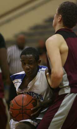 Bryant's Arron Bell looks for a crease to drive through. (Photo by Rick Nation)