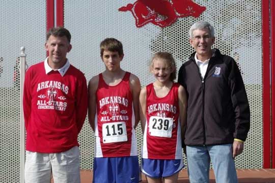 From left, boys coach Steve Oury, Luke Lindsley, Hannah Raney and girls coach Dan Westbrook represented Bryant High School at the annual Arkansas-Oklahoma All-Star cross country competition on Saturday in Fayetteville. 