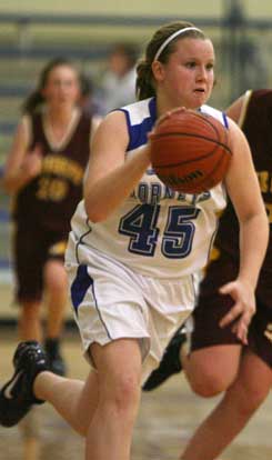 Bryant's Hayley Murphy pushed the ball up the floor. (Photo by Rick Nation)