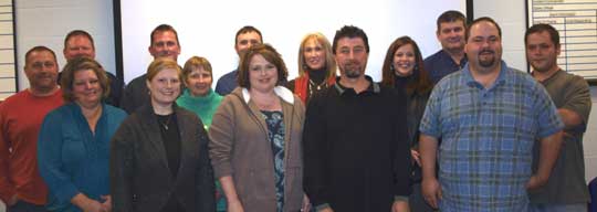 Graduates of the Bryant Police Department’s Citizen’s Police Academy included, front from left, Christen Helton, Deborah Wade, Bill Middleton, Don Hensley; second row, Jason Stallmann, Kim Wheelbarger, Debbie Bertelin, Joan Hunter, Roxane Whitesides, and Jared Hensley; back row, instructor Sgt. Jenceson Payte, Jeremiah Oltmans, Rick Everhart, and Police Chief Tony Coffman.