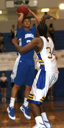 Dontay Renuard, left, is one of the returning contributors to the Bryant Hornets 2009-10 basketball team. (Photo by Rick Nation)