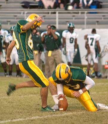 Arkansas Tech kicker Travis Cockerham swings into a field-goal attempt during a Wonder Boys' game earlier this season. (Photo courtesy of The Courier of Russellville)
