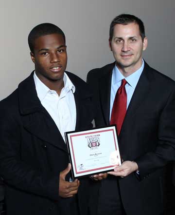 Bryant's Chris Rycraw and Bryant State Farm agent Matthew Reginelli at the State Farm Awards banquet on Monday. (Photo courtesy of Nelson Chenault)