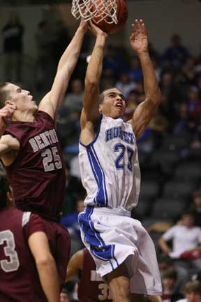 Bryant's K.J. Hampton (23) gets his shot blocked by Benton's Luke Vance (25). (PHoto by Rick Nation)