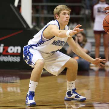 Bryant got a lift off the bench from Kyle Nossaman during Friday's Shootout against Benton. (PHoto by Rick Nation)