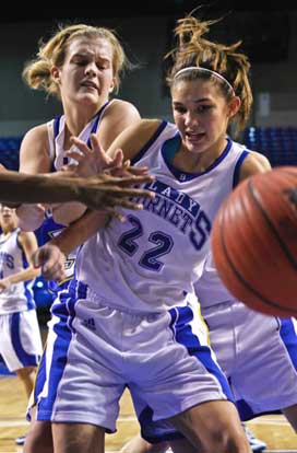 Bryant's Hannah Goshien fights through traffic to maintain possession of the ball. (Photo by Gareth Patterson)