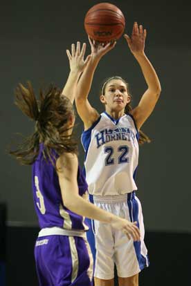 Hannah Goshien (22) shoots over CAC defender Haley Hatcher. (Photo by Rick Nation)