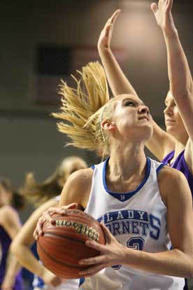 Abbi Stearns looks for room to shoot over CAC's Shelby Tankersley. (Photo by Rick Nation)