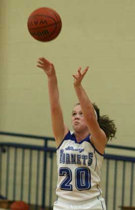 Logan Davis hit a pair of first-quarter 3-pointers to help loosen up the Sheridan defense. (Photo by Rick Nation)