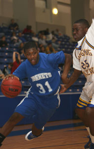 Bryant's Dijon Benton, 31, drives around North Little Rock's Chris Campbell.