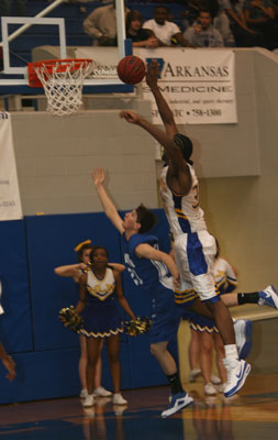 Tyler Gattin's shot with :06 left in regulation was actually tipped by North Little Rock's 6-8 center Terry Tidwell on its way into the hoop.