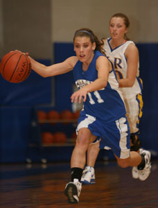 Bryant's Haley Montgomery pushed the ball up the floor against the North Little Rock press.