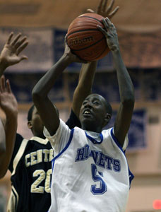 K-Ron Lairy goes up for a shot in front of Little Rock Central's Andre Dennis.