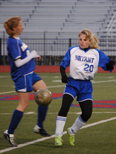 Lauren Reed, 20, maneuvers past a Mountain Home defender.