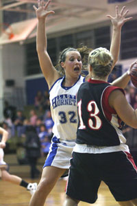 Bryant Lady Hornets forward Kenzee Calley, 32, defends against Russellville's Janesa Hudson, 13.