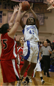 Bryant's Alana Morris (45) shoots over Cabot's Stephanie Glover.