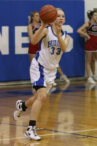 Bryant's Abbi Stearns passes the ball upcourt.