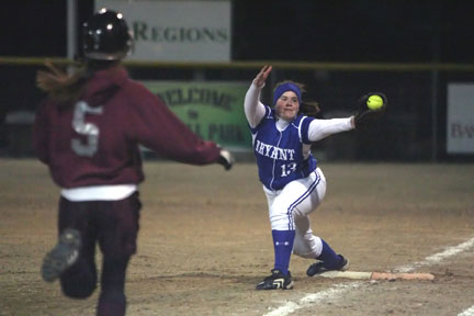 Bryant's Brandi Barnes stretches to grab a throw at first base.