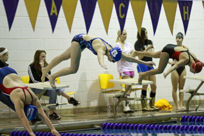 Alexa Eddy launches into the pool during the South District Swim/Dive championships.