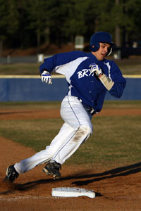 Garrett Bock rounds third on his way to a first-inning run.