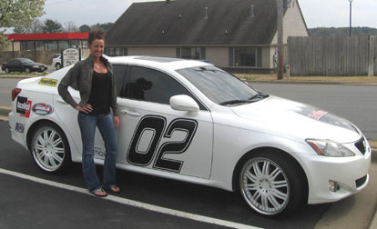 Brooke Bettoney and her decal-laden Lexus star in SpeedTV's Bullrun.