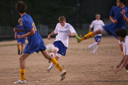 Bryant senior Aaron Prewitt drills his second goal of the game, snapping a 1-1 tie with North Little Rock on Tuesday. (Photo by Rick Nation)