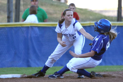 Bryant's Jessie Taylor applies a tag at third.