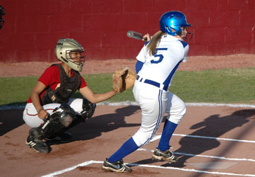 Jenna Bruick moves toward a pitch, for a slap at the ball. (Photo by Mark Hart)