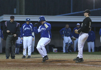 Hunter Mayall scores the only run of Tuesday night's 7A-Central Conference game between Bryant and Little Rock Central.