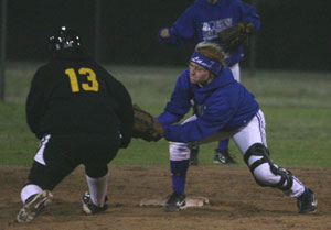 Bryant second baseman Lana Naumann tags out Little Rock Central's Nakia Lee.