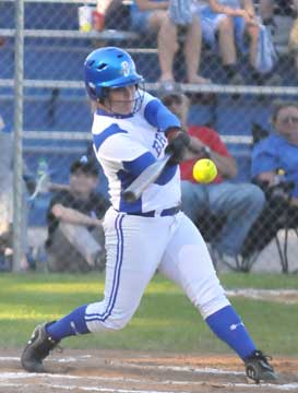 Christen Kirchner belts one of her two homers. (Photo by Kevin Nagle)