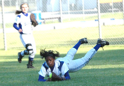Shanika Johnson makes a diving catch in right field to rob a Mount St. Mary's batter of a hit during the first game of Tuesday's doubleheader. (Photo by Mark Hart)