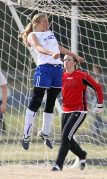 Amber Manning heads the ball in front of the Conway goal. (Photo by Misty Platt)