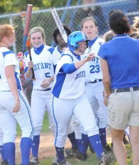 Peyton Jenkins is congratulated after her solo homer on the heels of teammate Christen Kirchner's second round-tripper. (Photo by Kevin Nagle)