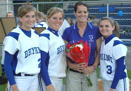 Bryant Lady Hornets seniors, from left, Sarah Hart, Christen Kirchner, head coach Lisa Stanfield, and Paige Turpin were honored at Senior Night on Tuesday. (Photo by Mark Hart)