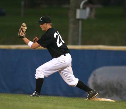 Brady Butler stretches for a throw to first. (Photo by Rick Nation)