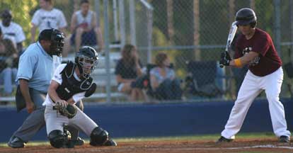 Bryant catcher B.J. Ellis snags a pitch in the dirt during Tuesday's game. (Photo by Rick Nation)