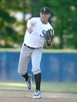 Tyler Sawyer fires a throw to first. (Photo by Rick Nation)