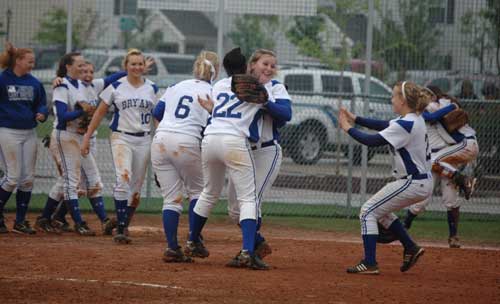 The Bryant Lady Hornets softball team celebrates advancing to the State championship game. (Photo by Mark Hart)