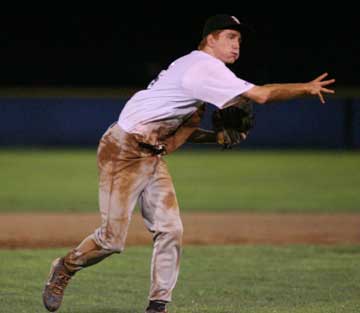 Shortstop Lucas Castleberry makes a throw home. (Photo by Rick Nation)