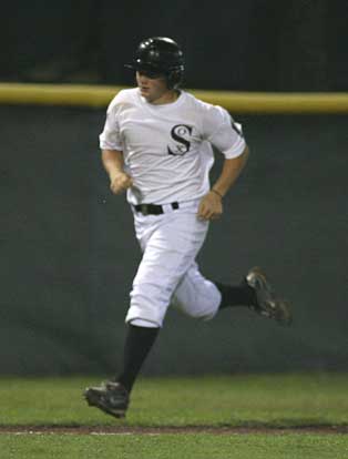 Brady Butler trots home after slugging a fifth-inning grand slam. (Photo by Rick Nation)