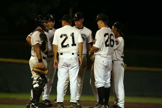 Black Sox manager Craig Harrison meets with pitcher Trent Daniel, catcher Kaleb Jobe and infielders Hunter Mayall, Tyler Sawyer (obsured), Brady Butler and Austin Benning.. (Photo by Rick Nation)