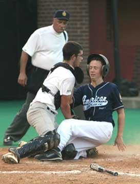 B.J. Ellis tags out Mason Speed at the plate during the second inning of Thursday's game. (Photo by Rick Nation)