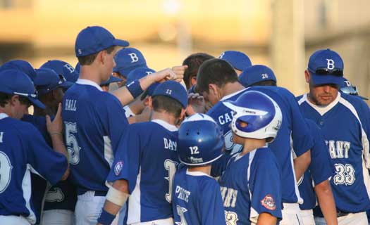 The Bryant 14-year-old Babe Ruth All-Stars wrap up a huddle with manager Jimmy Parker between innings on Tuesday. (Photo by Rick Nation)