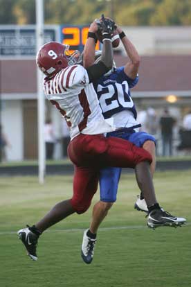 With the inside position, Bryant's Tanner Tolber (20) makes an interception. (Photo by Rick Nation)